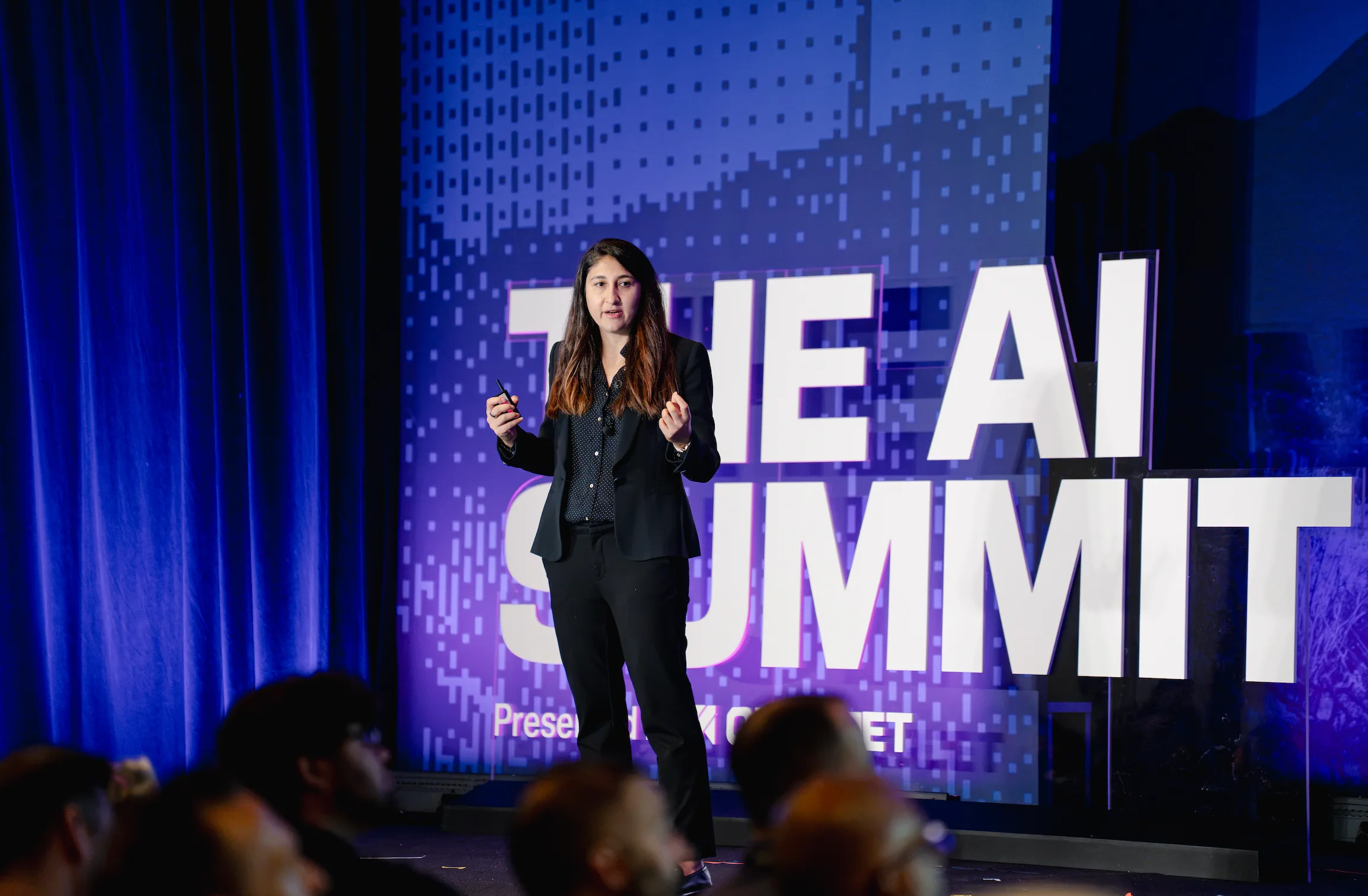 Keynote speaker on stage at The AI Summit